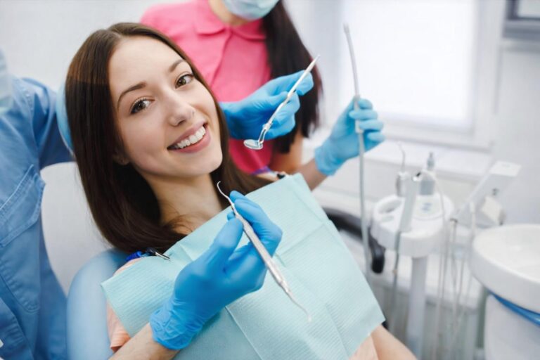 Patient receiving cosmetic dentistry and smile evaluation treatment in Colorado Springs for balanced natural facial rejuvenation